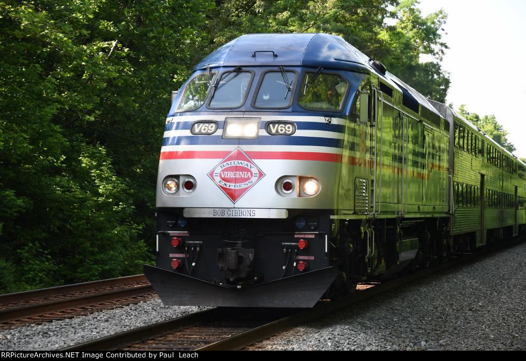 Outbound commuter approaches the station to makes its stop